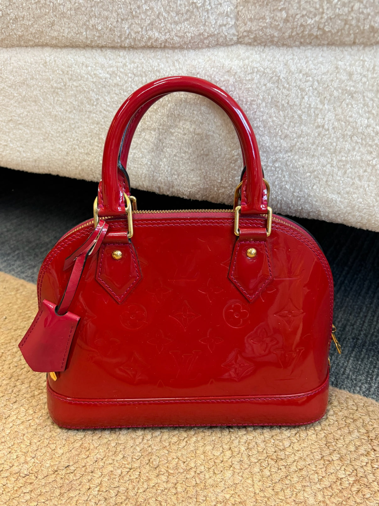 Louis Vuitton Alma BB red bag front view